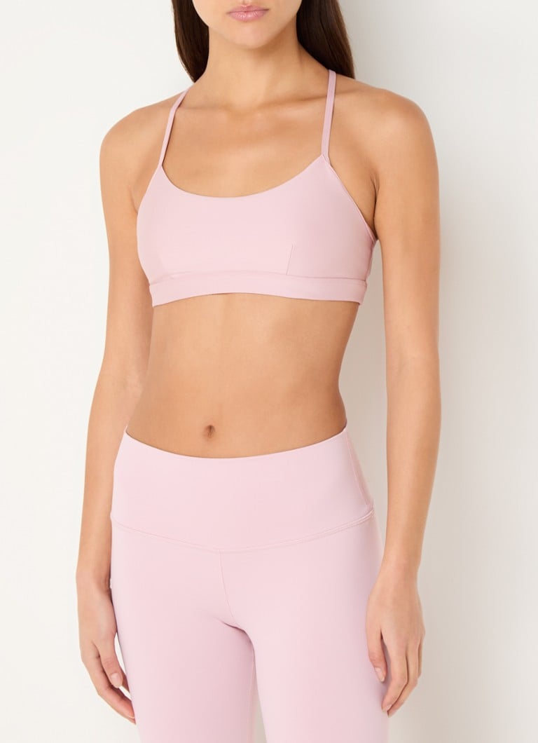 Alo Yoga - Intrigue Airlift sport bh met medium support - Lichtroze