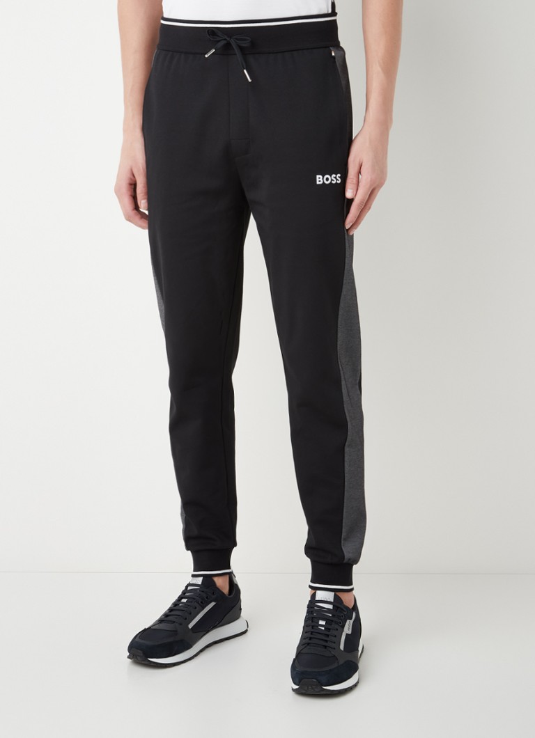 HUGO BOSS - Tapered fit trackpants met logo - Zwart