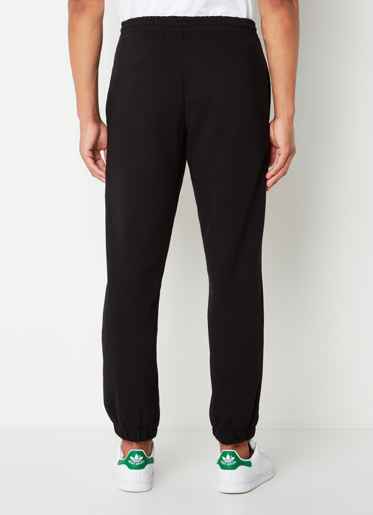 Pantalon de survêtement coupe tapered avec logo brodé De Bijenkorf Vêtements Pantalons & Jeans Pantalons Joggings 