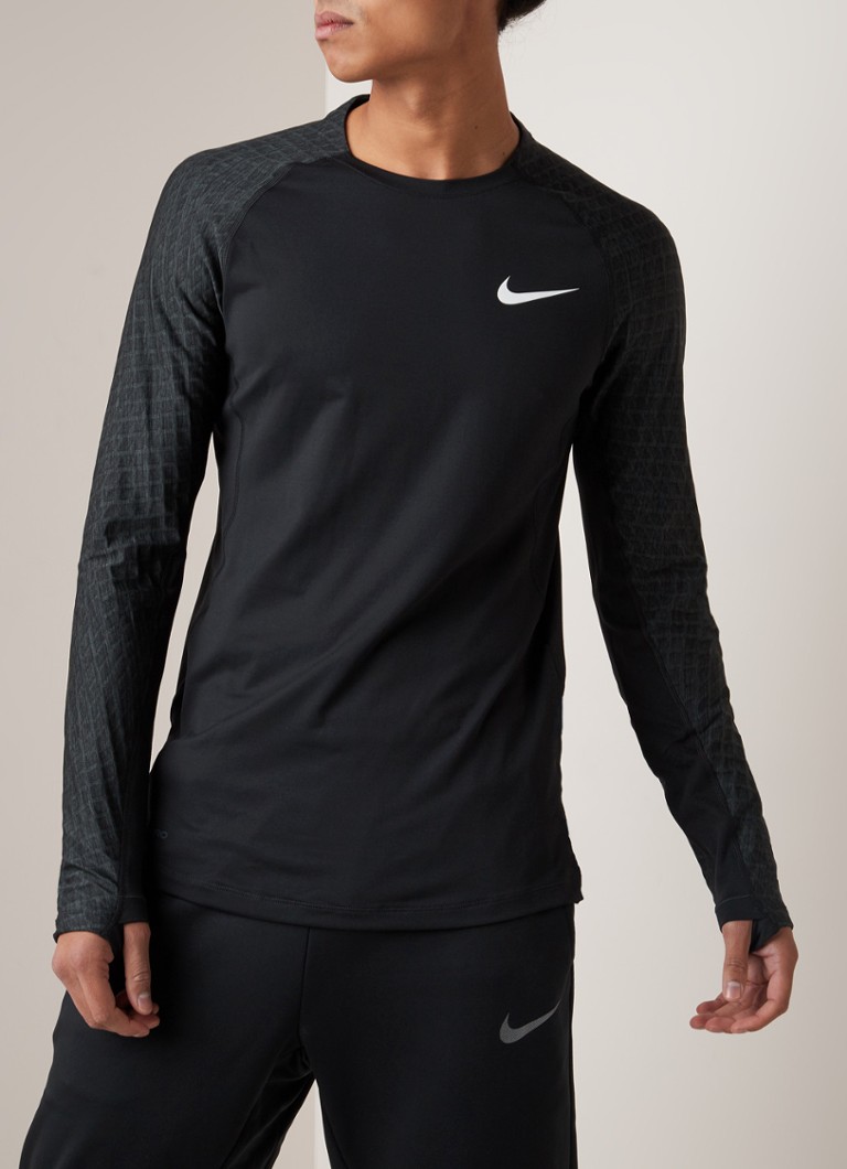 Nike - Trainingslongsleeve met raglanmouw in grafisch dessin - Zwart