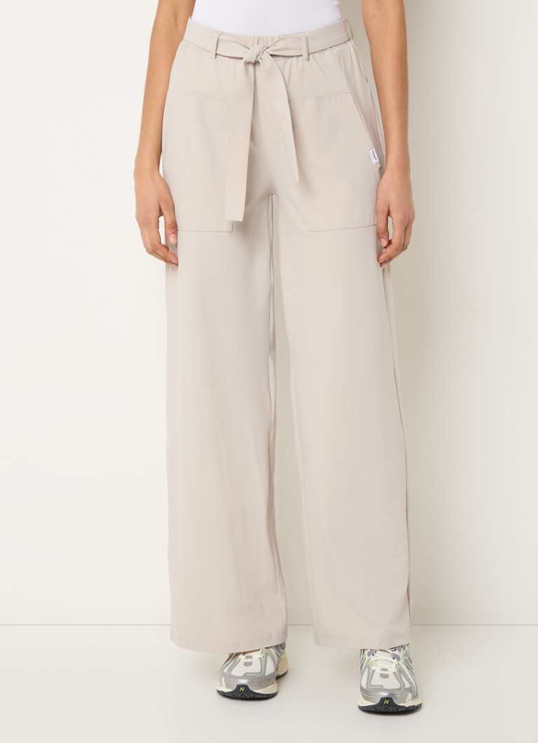 Penn & Ink - High waist loose fit pantalon in met steekzakken en elastische band - Beige