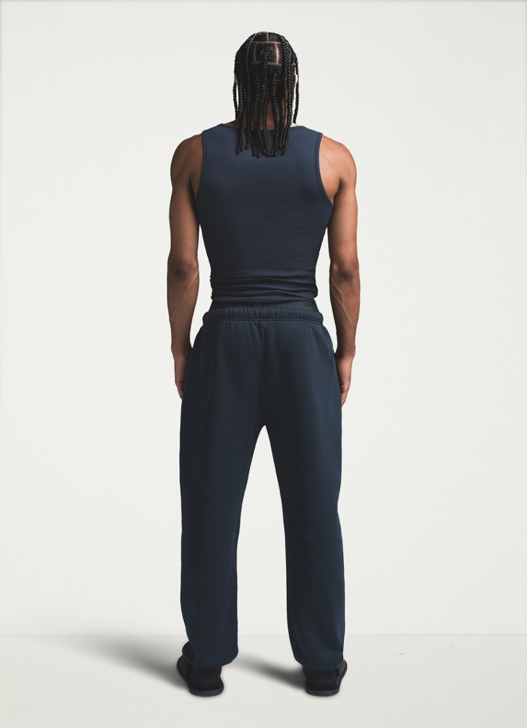 SKIMS - Fleece lounge tapered fit loungebroek met steekzakken - Donkerblauw