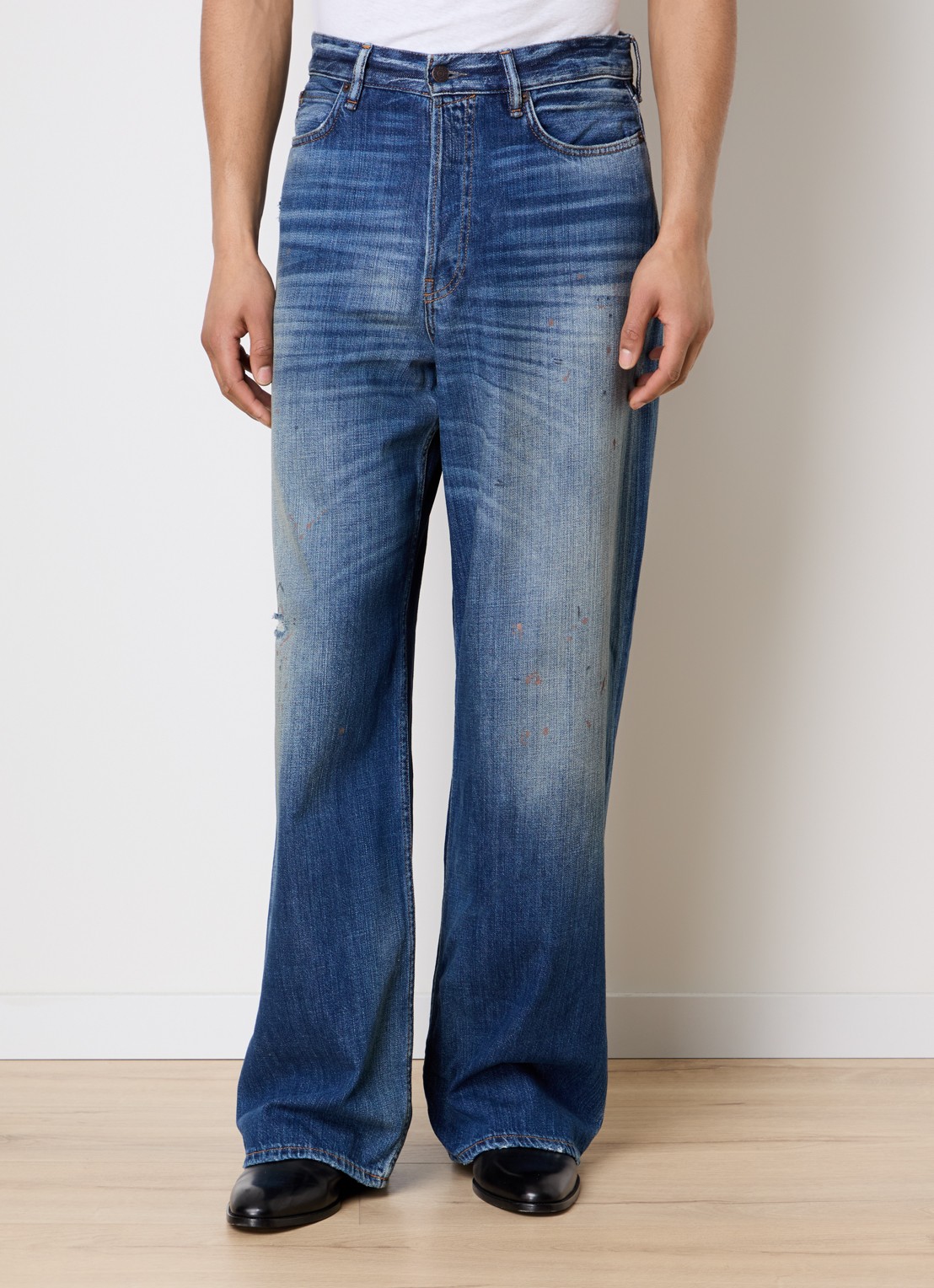 Acne Studios Loose fit jeans met medium wassing en verwassen afwerking - detail blauw