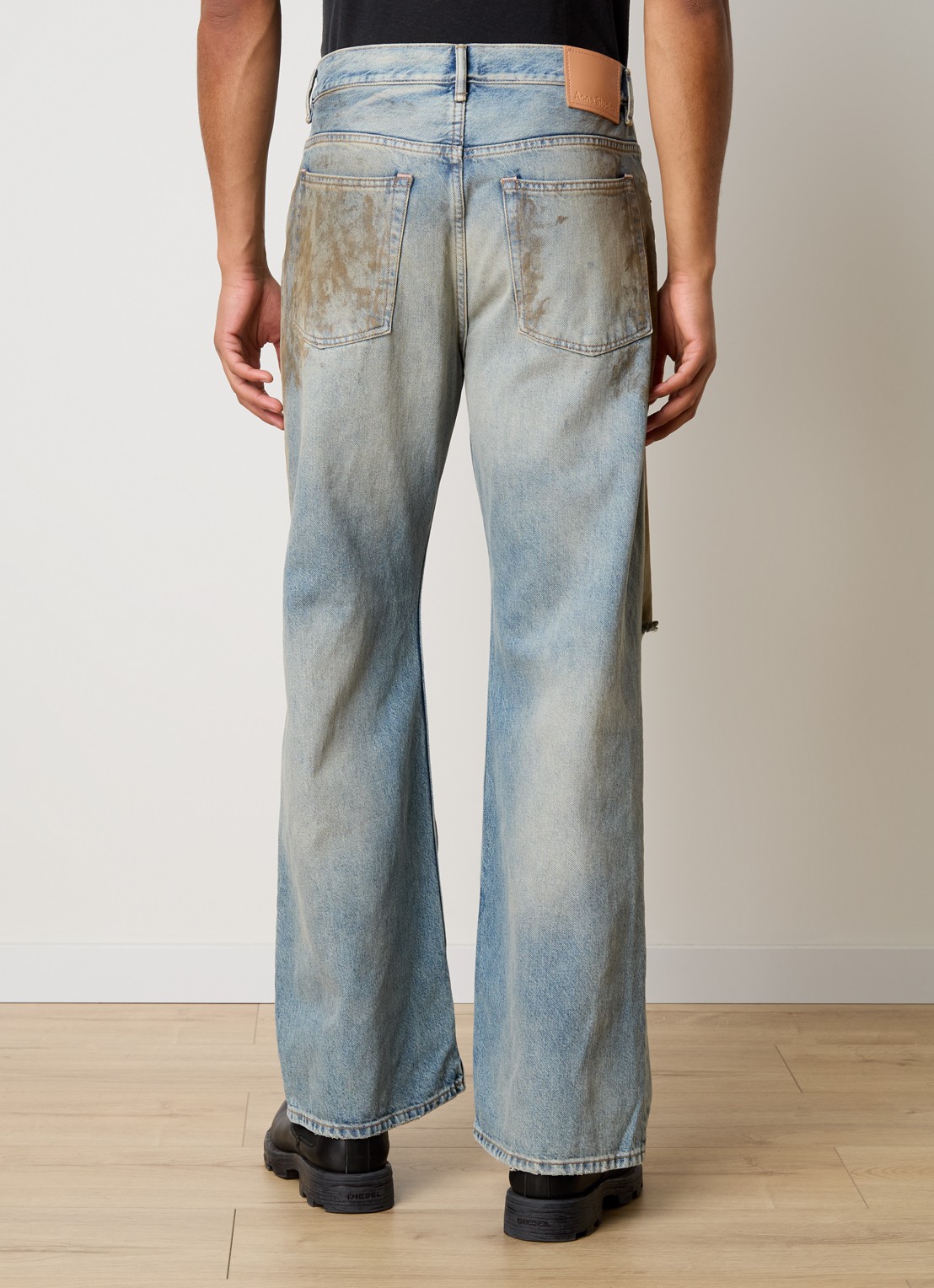 Acne Studios Loose fit jeans van  katoen met destroyed afwerking - achterkant indigo