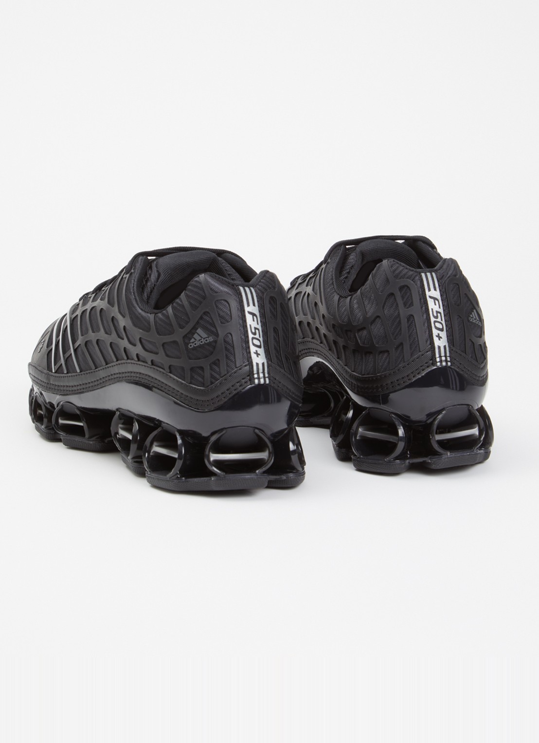 Adidas Megaride F50 sneaker met mesh details - achterkant zwart