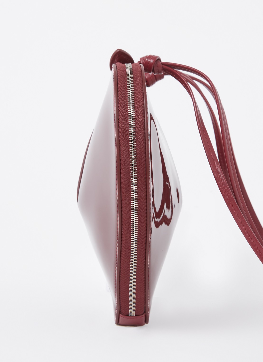 Alaïa Le Coeur crossbodytas van kalfsleer  - detail 3 bordeauxrood