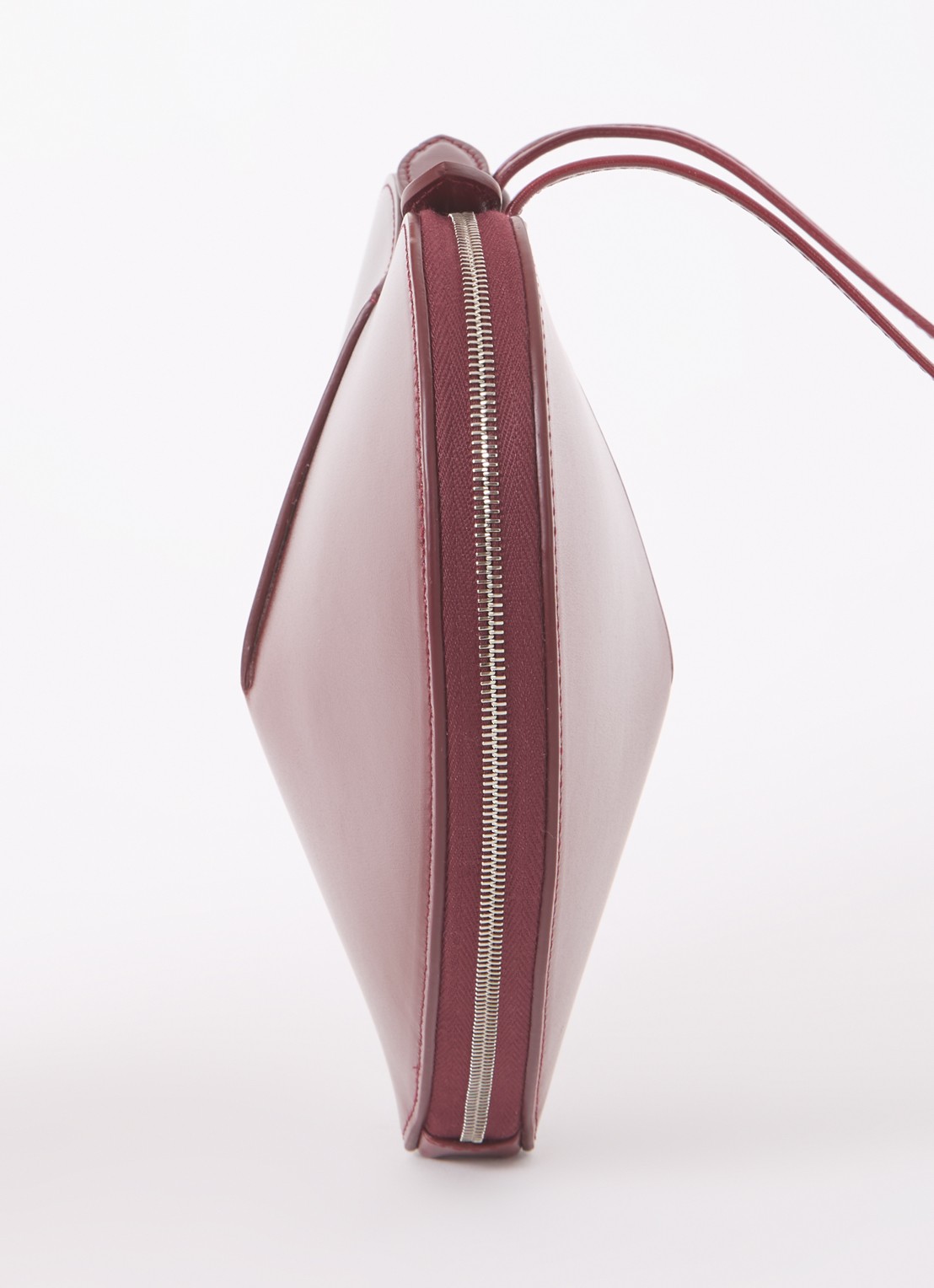 Alaïa Le Coeur crossbodytas van kalfsleer - detail 5 bordeauxrood