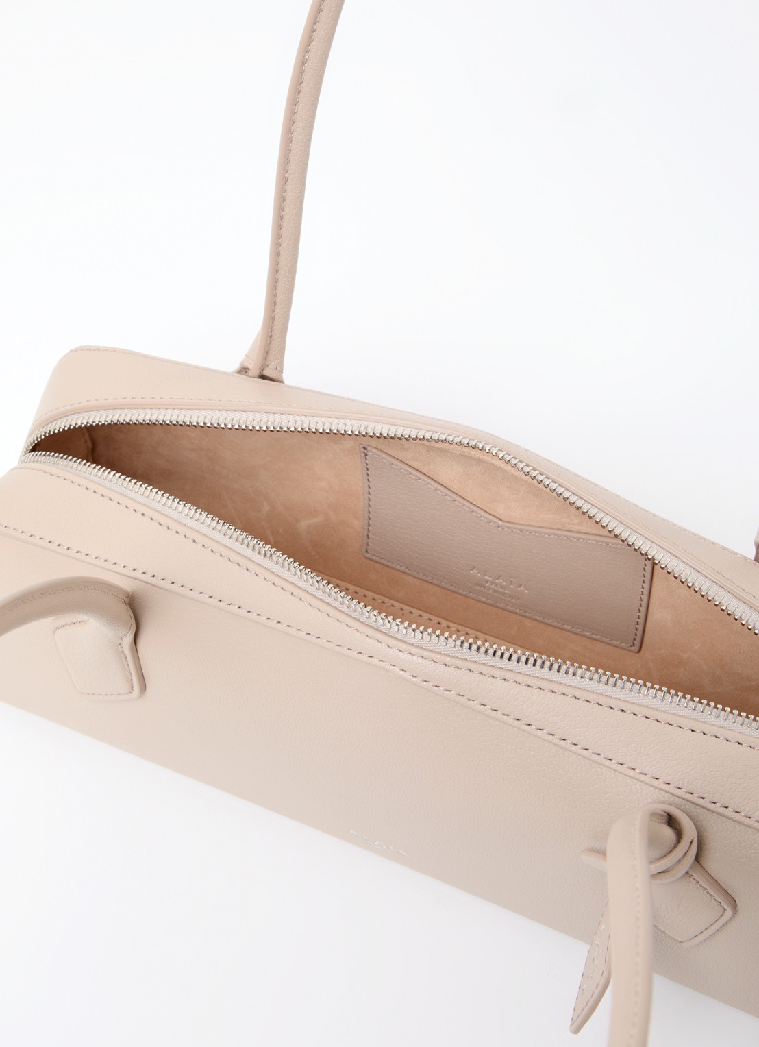 Alaïa Le Demi-Coeur S schoudertas van geitenleer - detail beige
