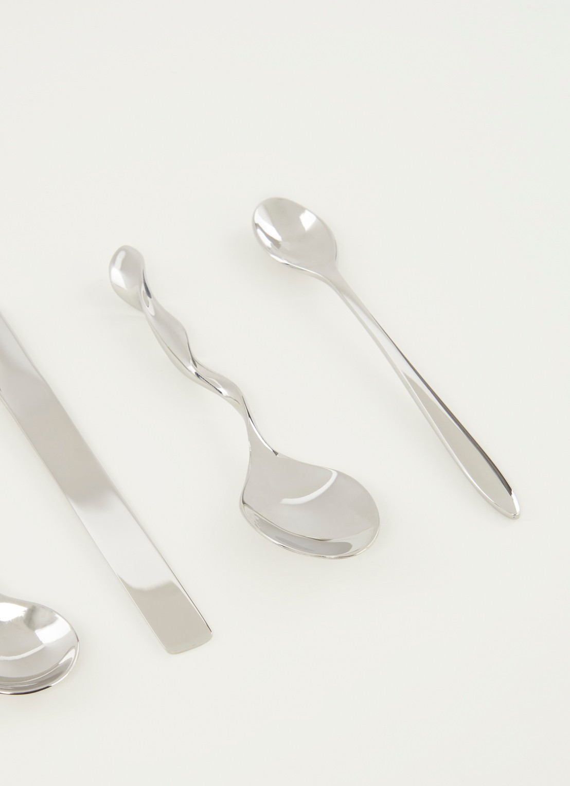Alessi Koffielepel set van 8 - detail zilver