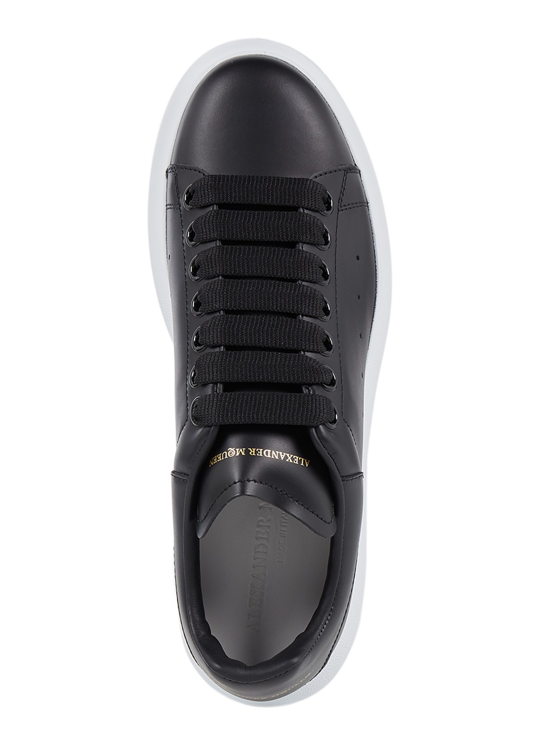 Alexander McQueen Oversized sneaker van kalfsleer - detail zwart