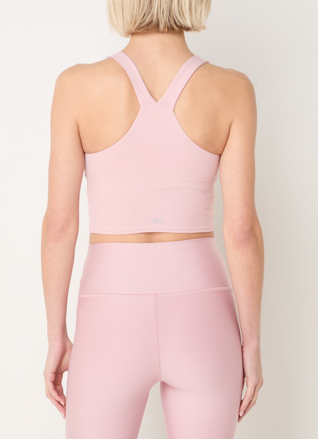 Alo Yoga Real Bra sport bh met medium support - achterkant oudroze