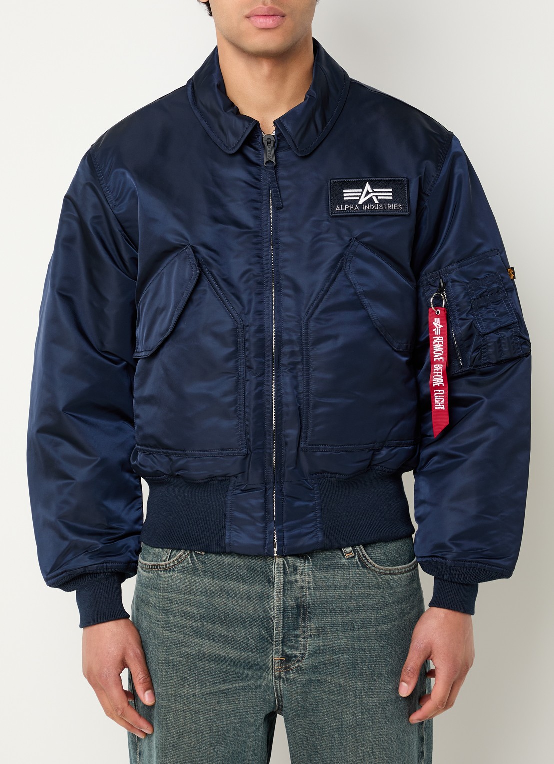 Alpha Industries CWU-45 bomberjack met logoborduring - detail donkerblauw
