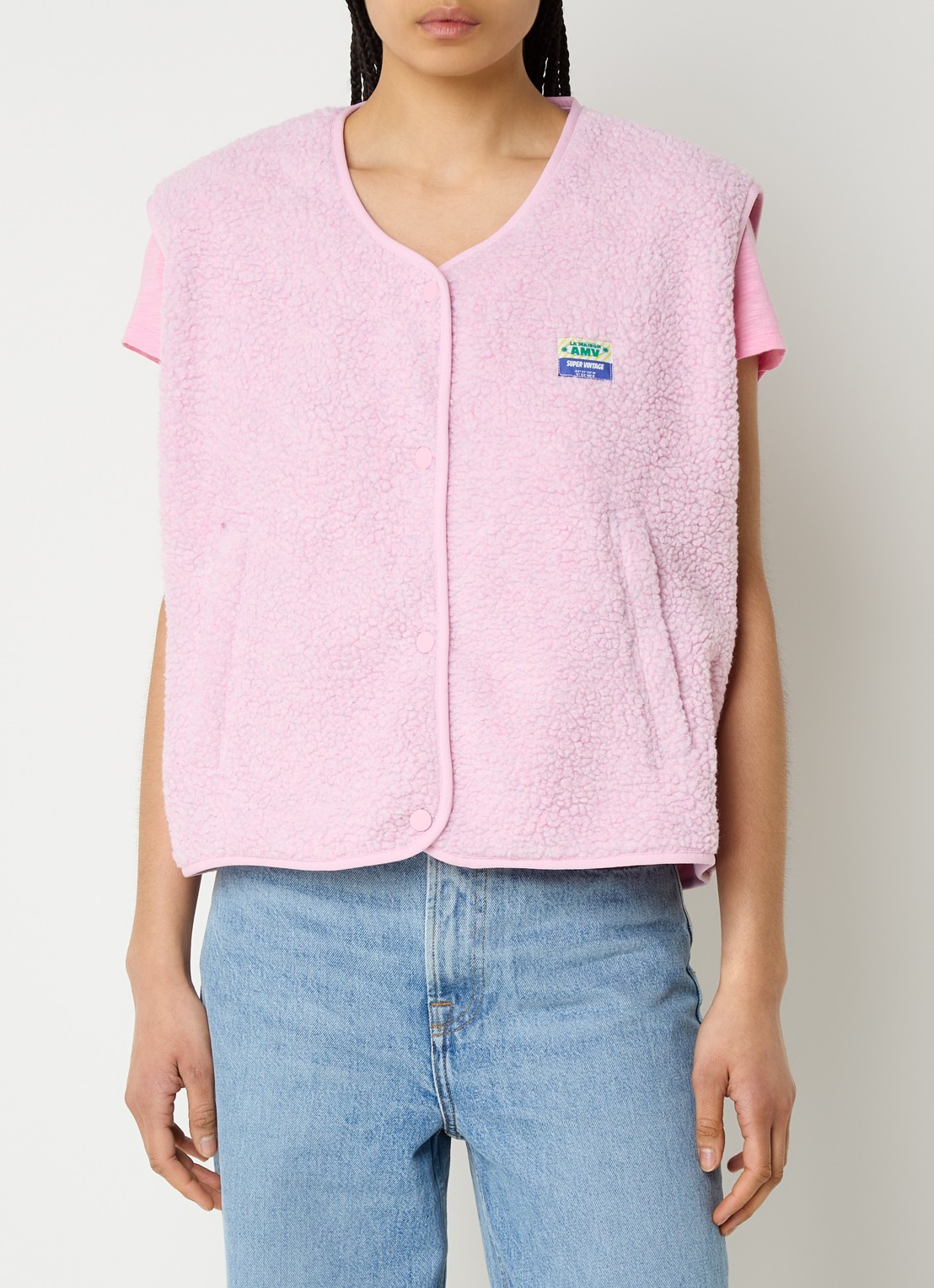 American Vintage Gilet van teddy met ritszakken - detail roze