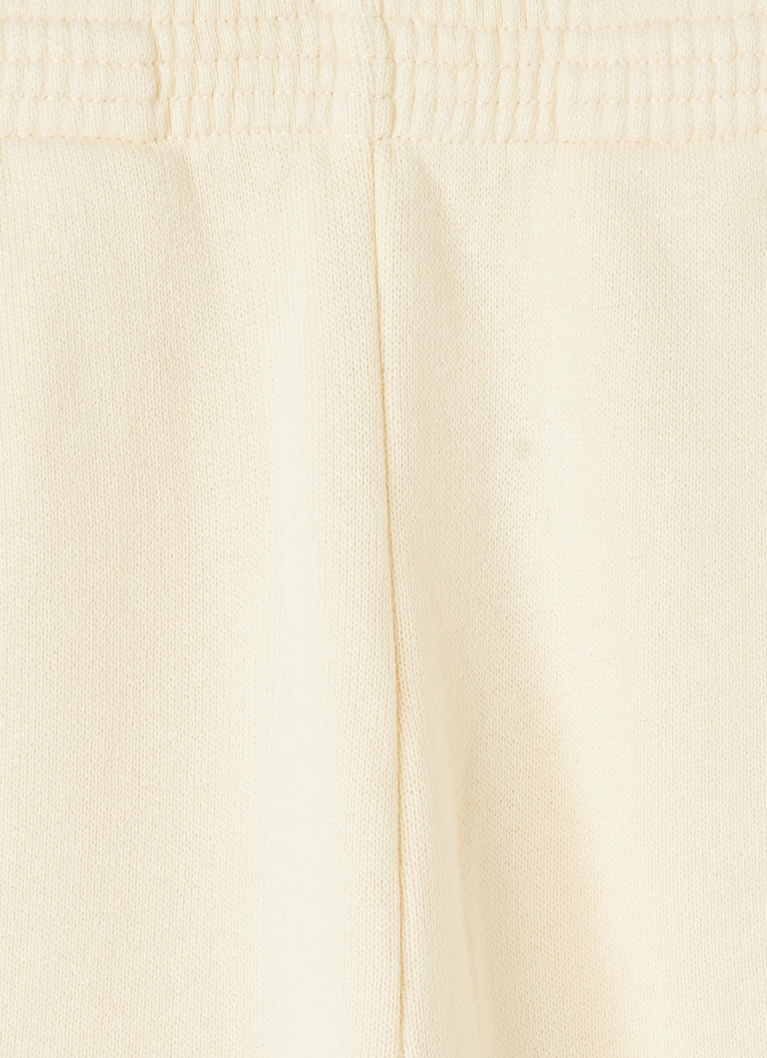American Vintage Izubird tapered fit joggingbroek met logo - detail lichtgeel