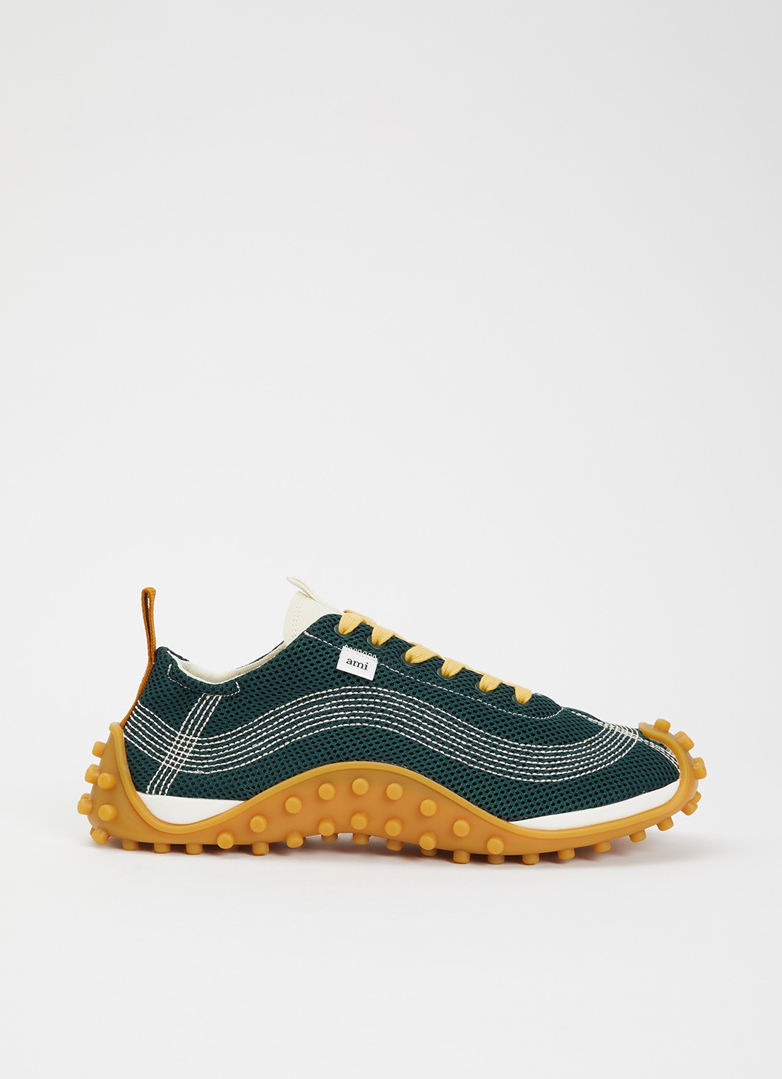 AMI Paris Mirage sneaker met schapenleren details - voorkant groen