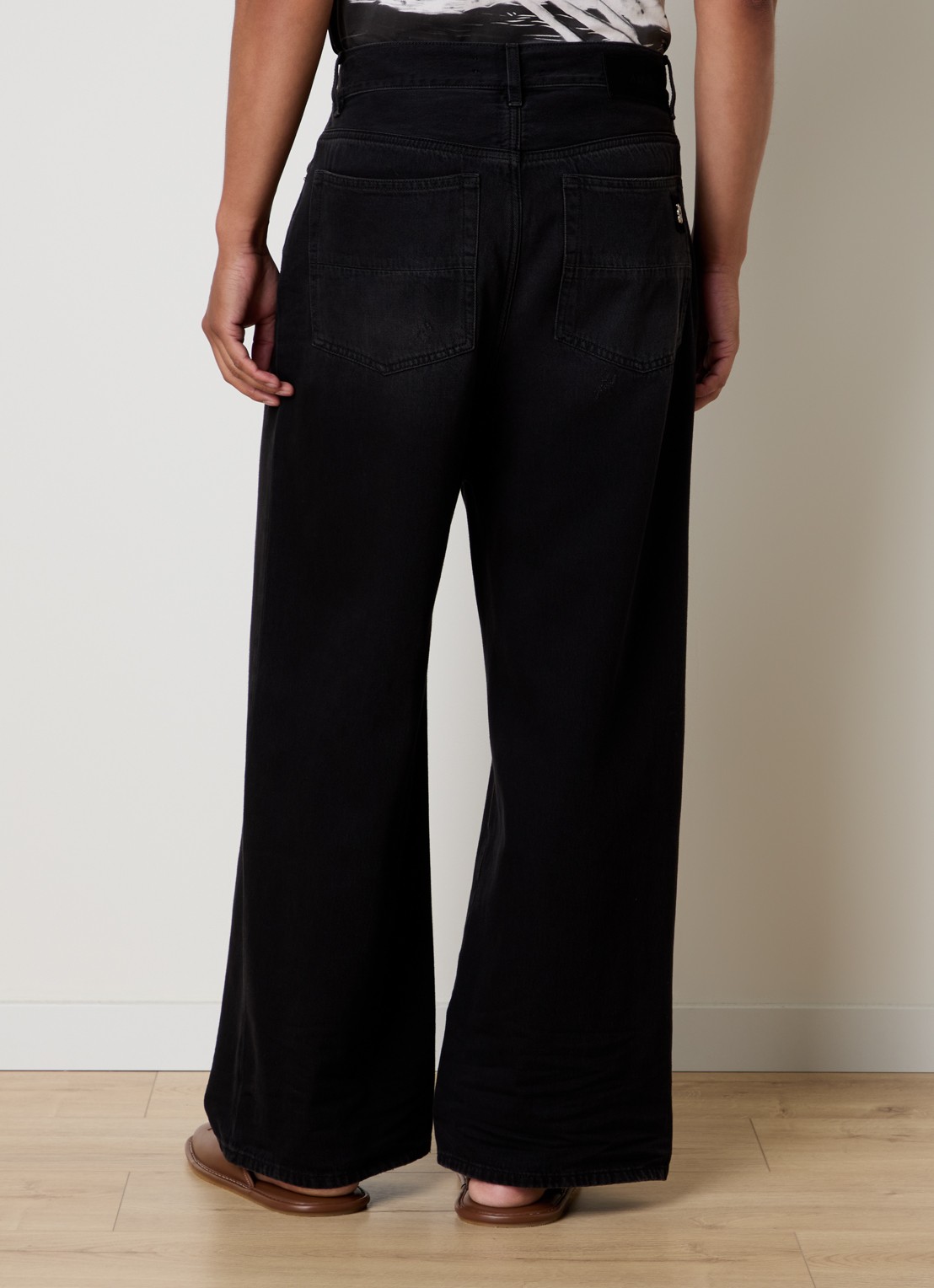 AMIRI Loose fit jeans met logo en steekzakken - achterkant zwart