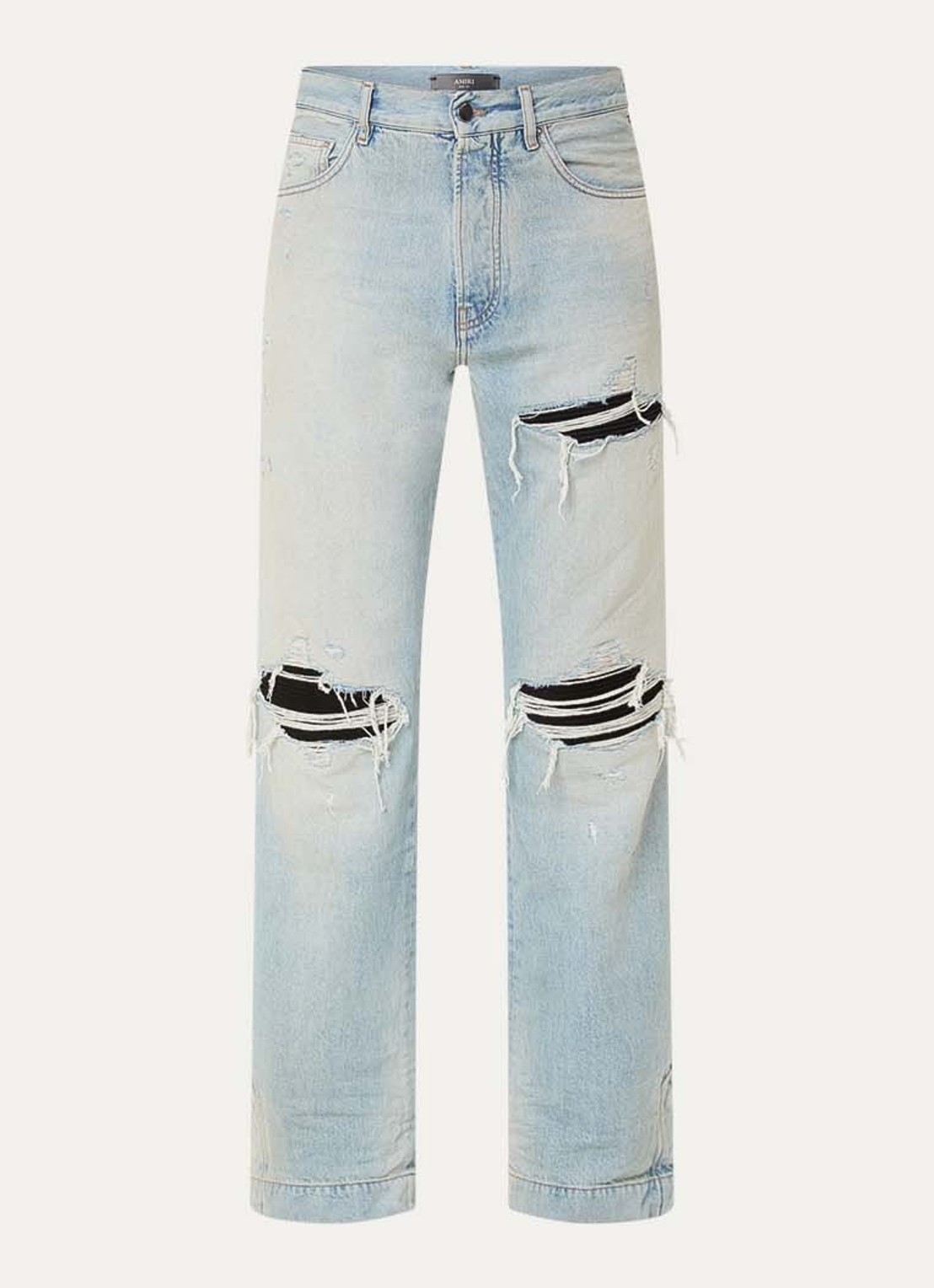 AMIRI MX1 loose fit jeans met destroyed afwerking - voorkant lichtblauw