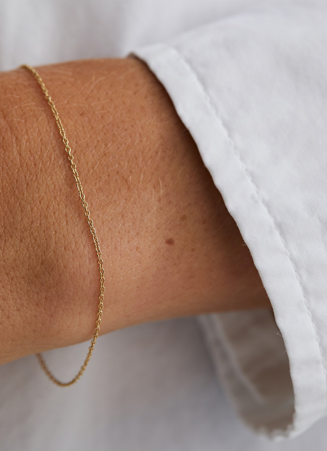 Anna + Nina Anchor armband van 14 karaat geelgoud - voorkant 2 geelgoud