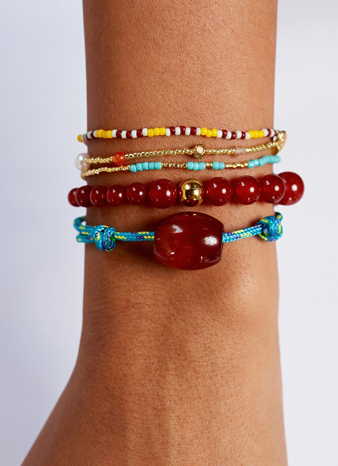 ANNI LU Float armband verguld  - voorkant 2 donkerrood