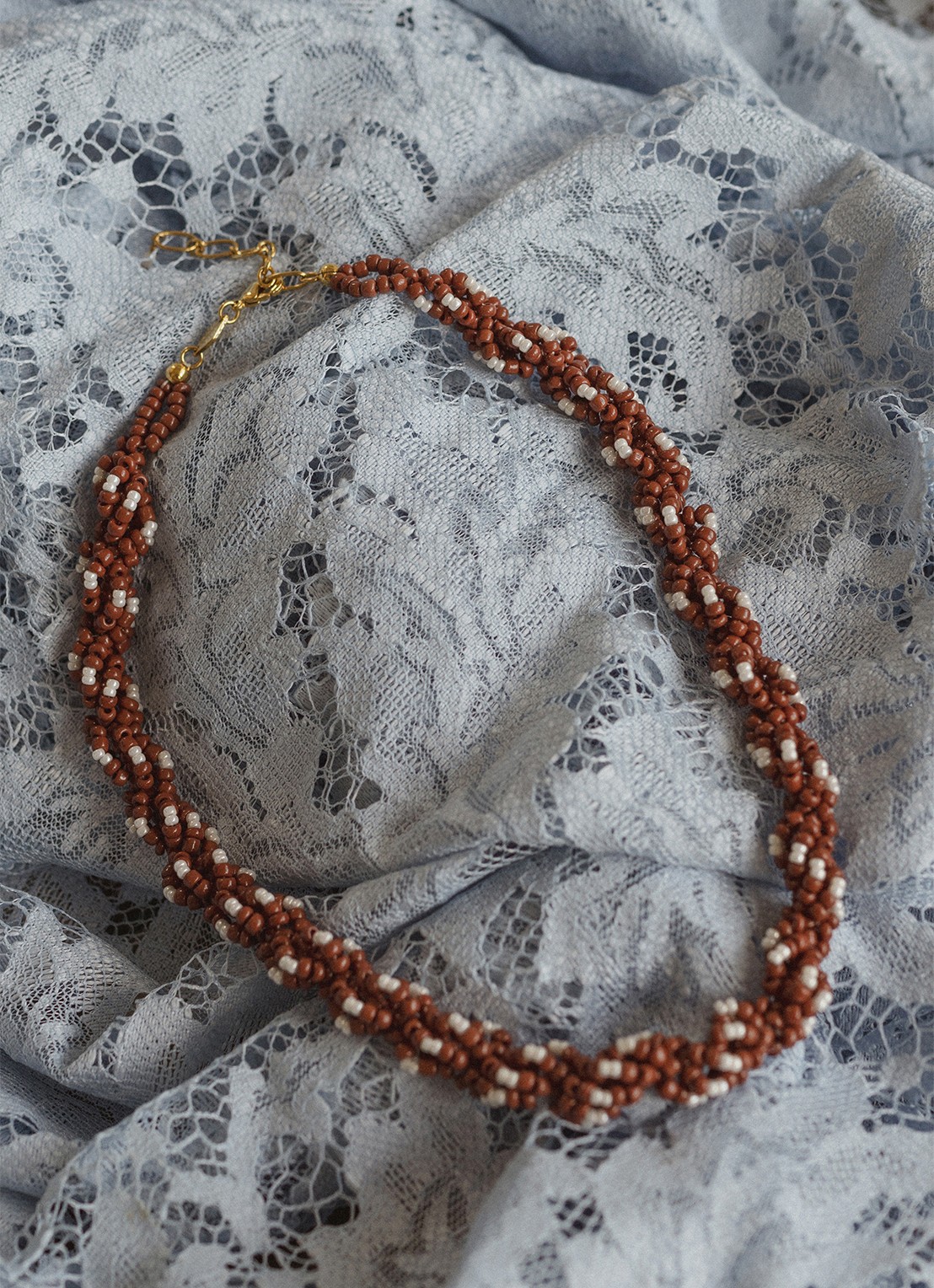 ANNI LU Rodeo kralenketting verguld - detail bruin
