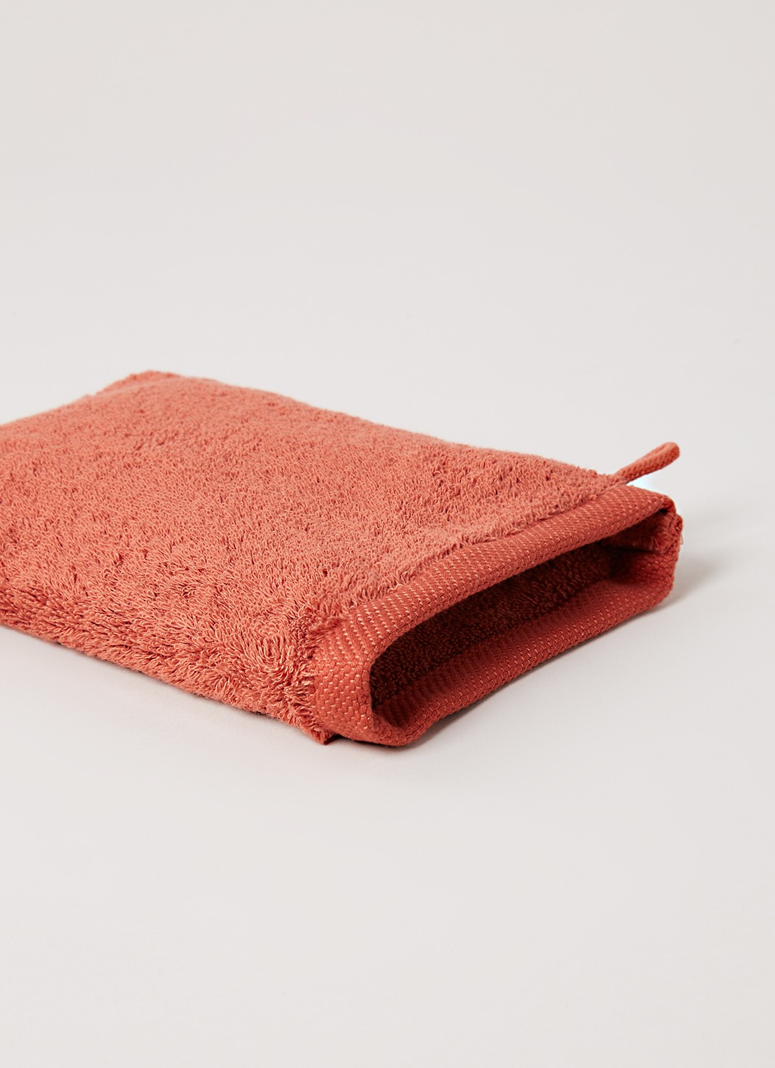 Aquanova London washand 16 x 22 cm - detail oranjerood