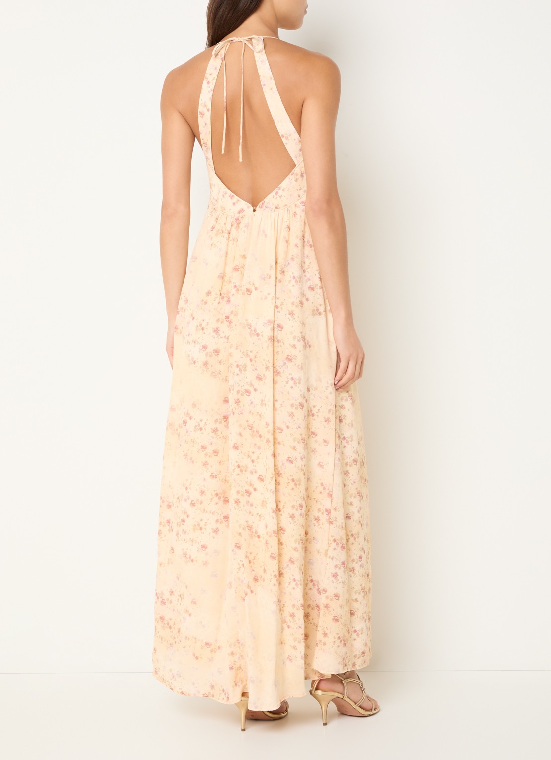 ba&sh Natz maxi jurk met bloemenprint en rugdecolleté - achterkant abrikoos