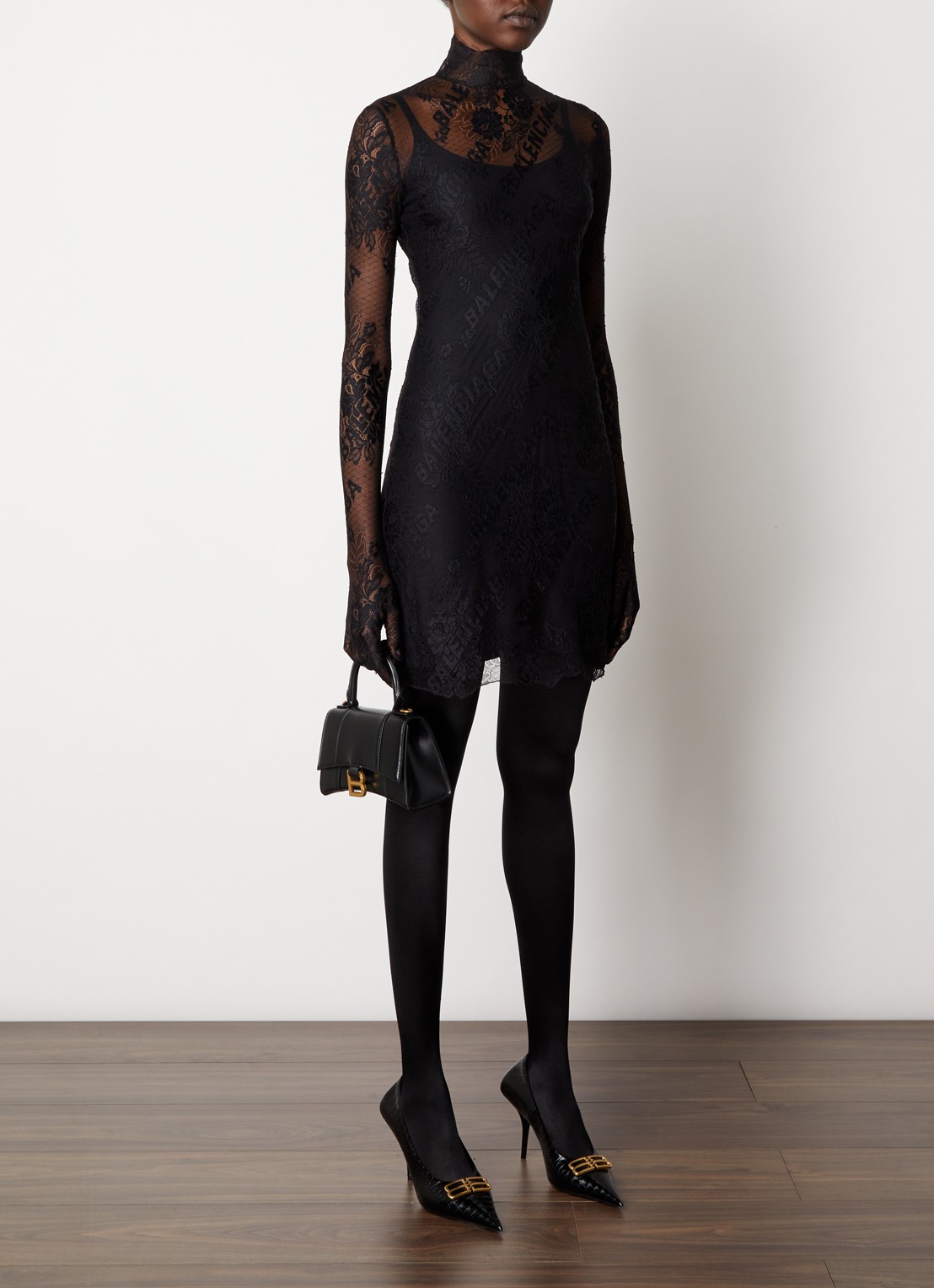 Balenciaga Mini jurk van kant met logoprint - voorkant zwart