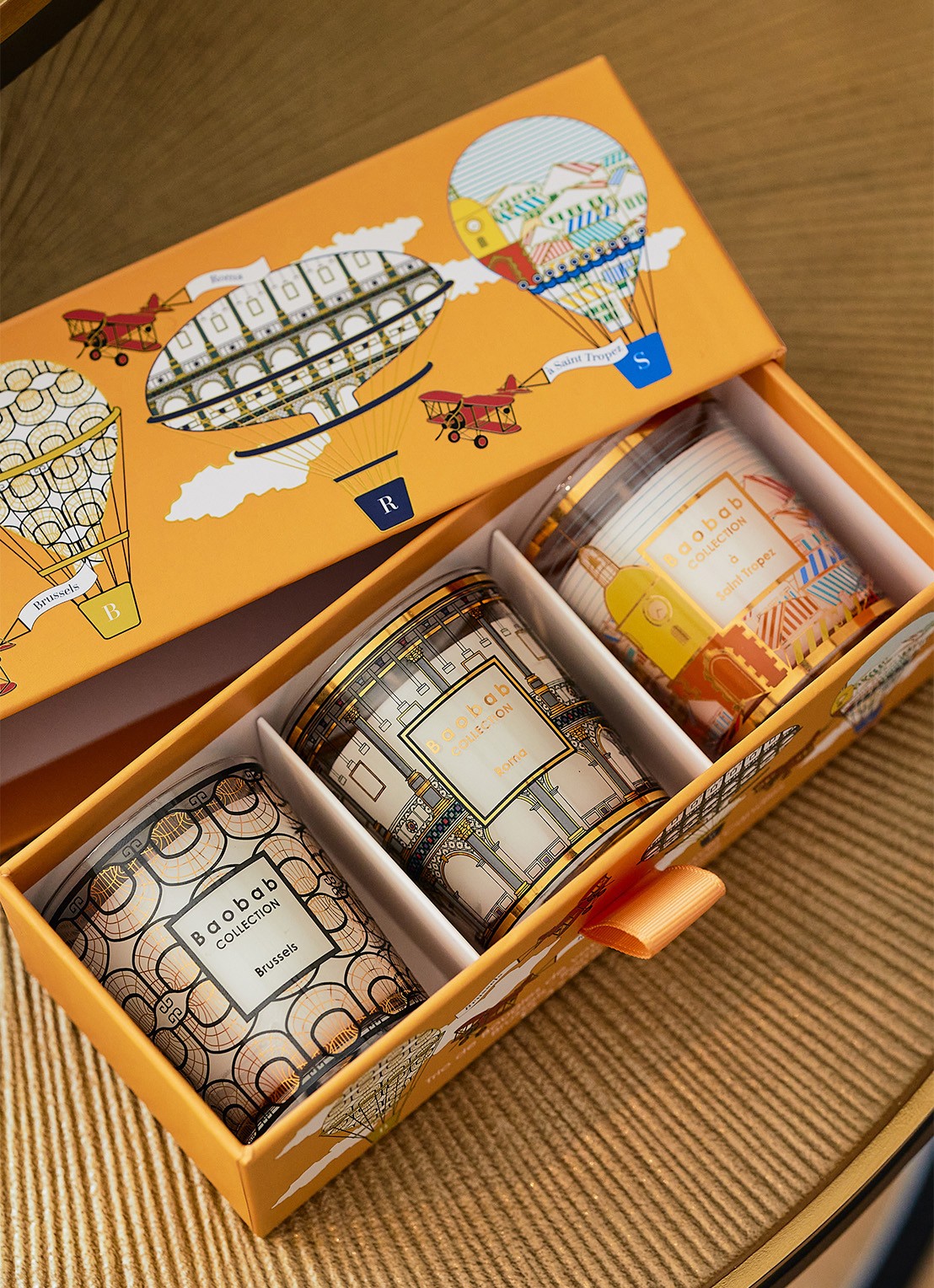 Baobab Collection Trio Travel geurkaarsen set van 3 - voorkant 2 orange
