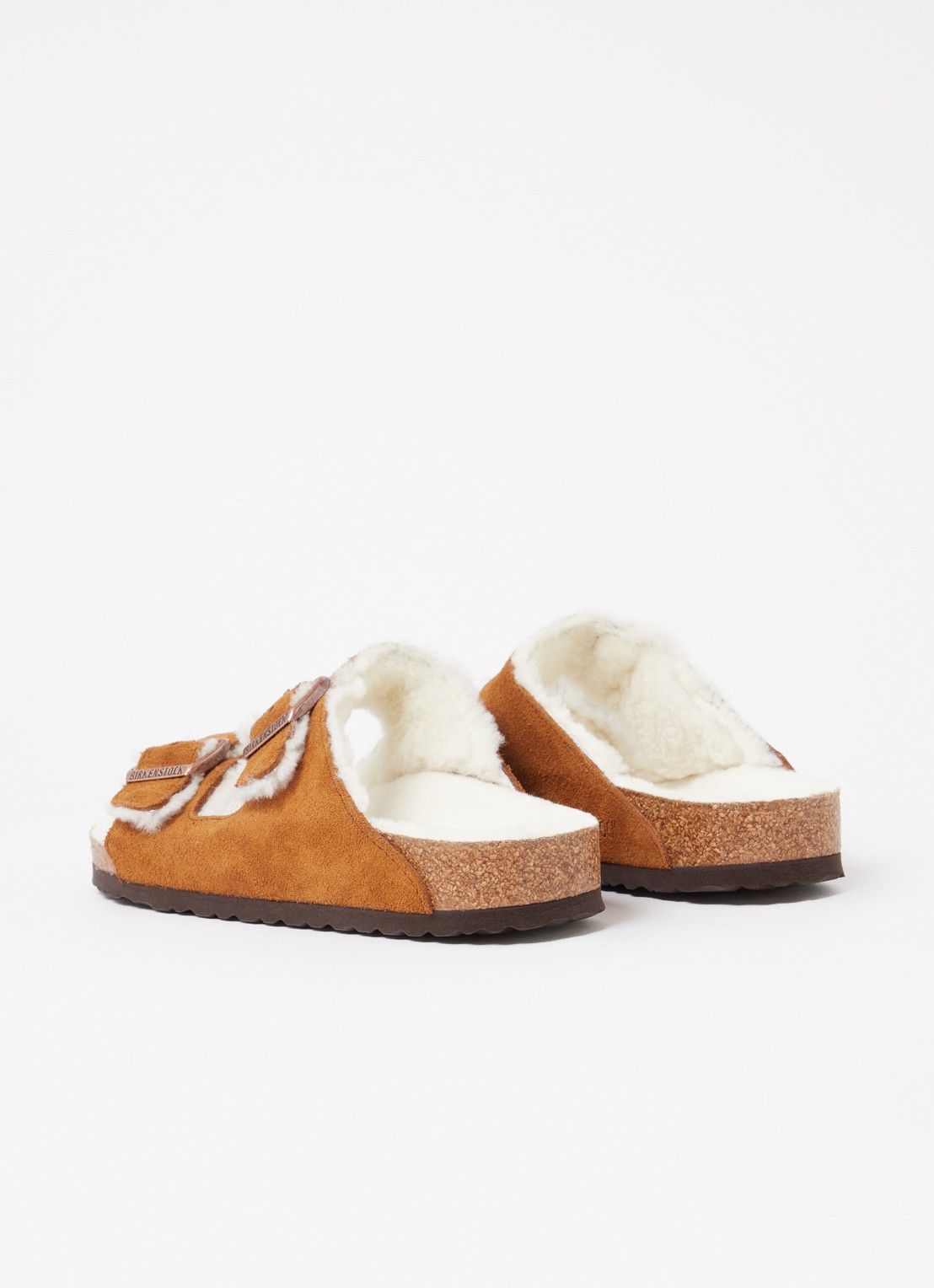 Birkenstock Arizona slipper met voering van lamswol - achterkant cognac