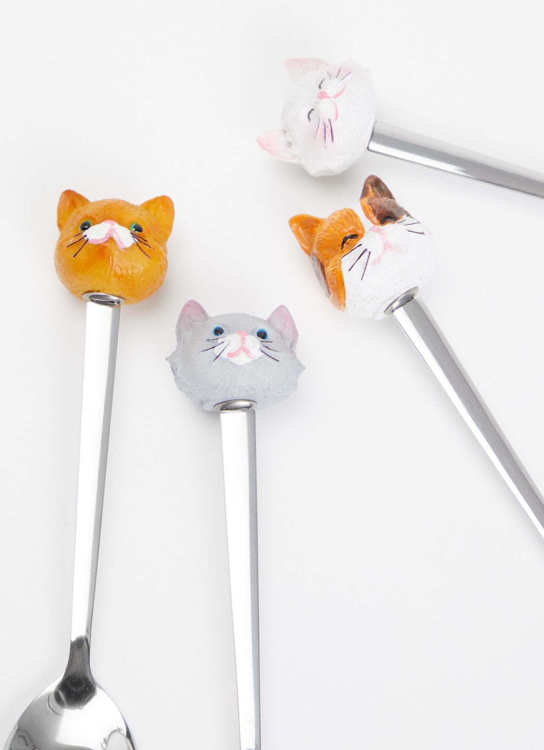 Blond Amsterdam Cat theelepel set van 4  - voorkant 2 zilver