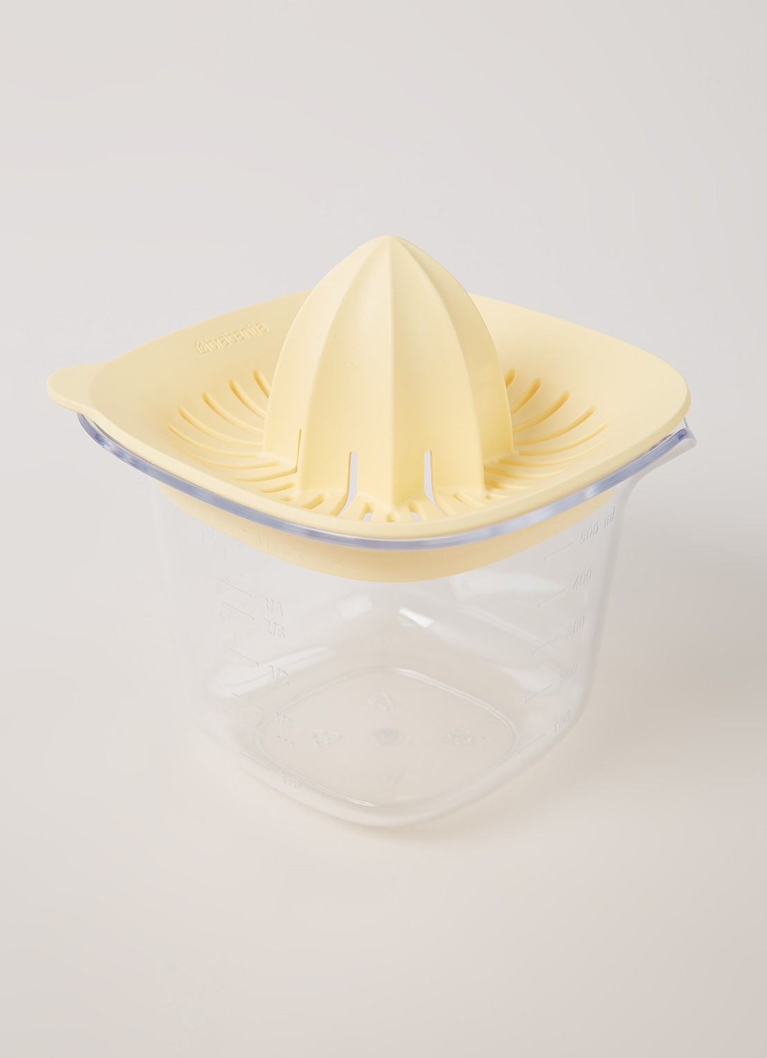 Brabantia TASTY+ citruspers met maatbeker 0,5 liter - voorkant 3 lichtgeel