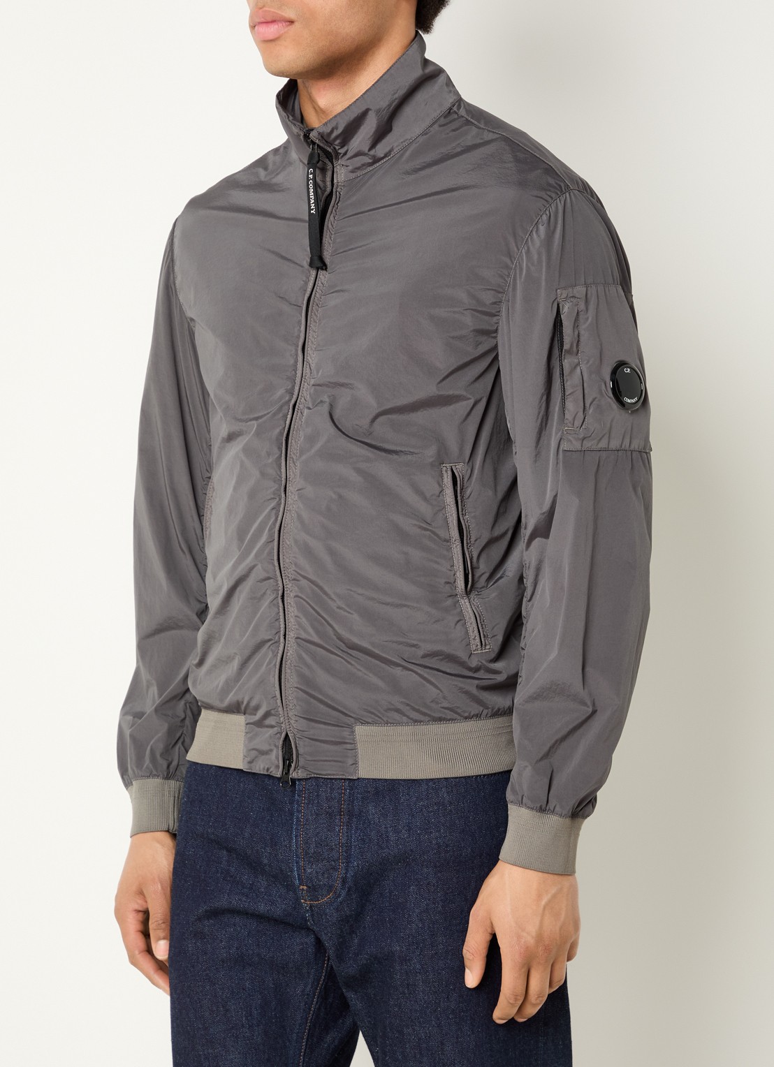 C.P. Company Jack met logo en ritszakken - detail grijs