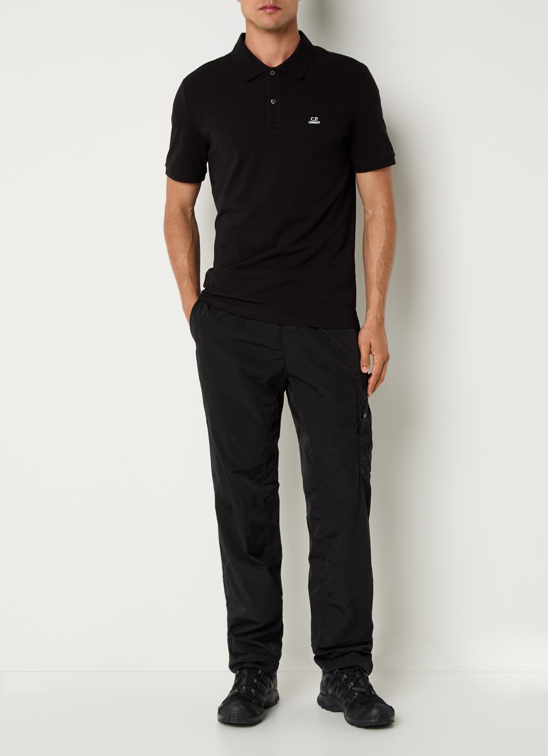 C.P. Company Regular fit polo met logoborduring - voorkant 3 zwart