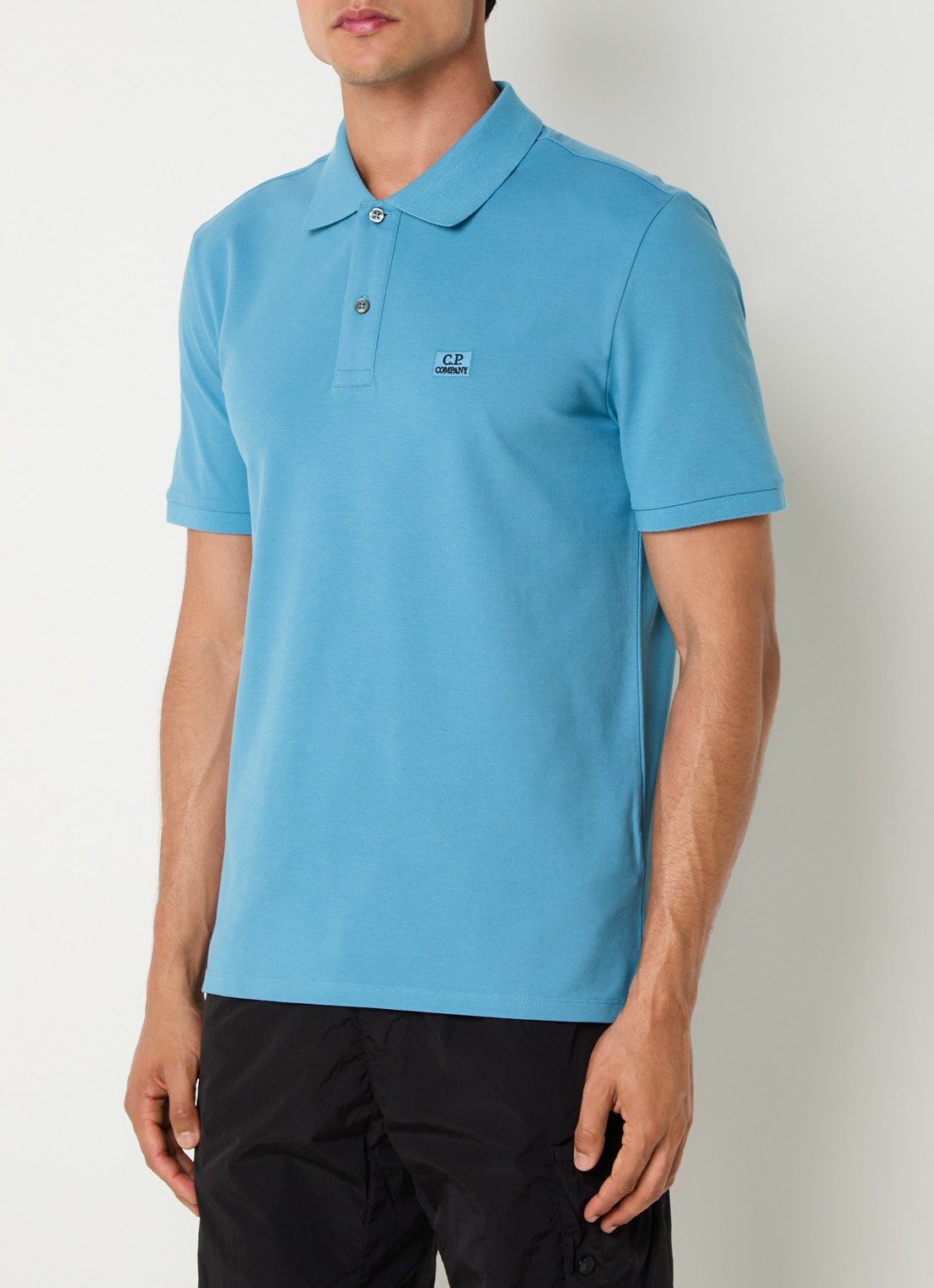C.P. Company Regular fit polo met logoborduring - detail blauw