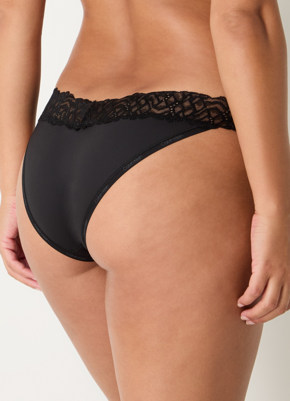 Calvin Klein Attraction slip met details van kant - achterkant zwart