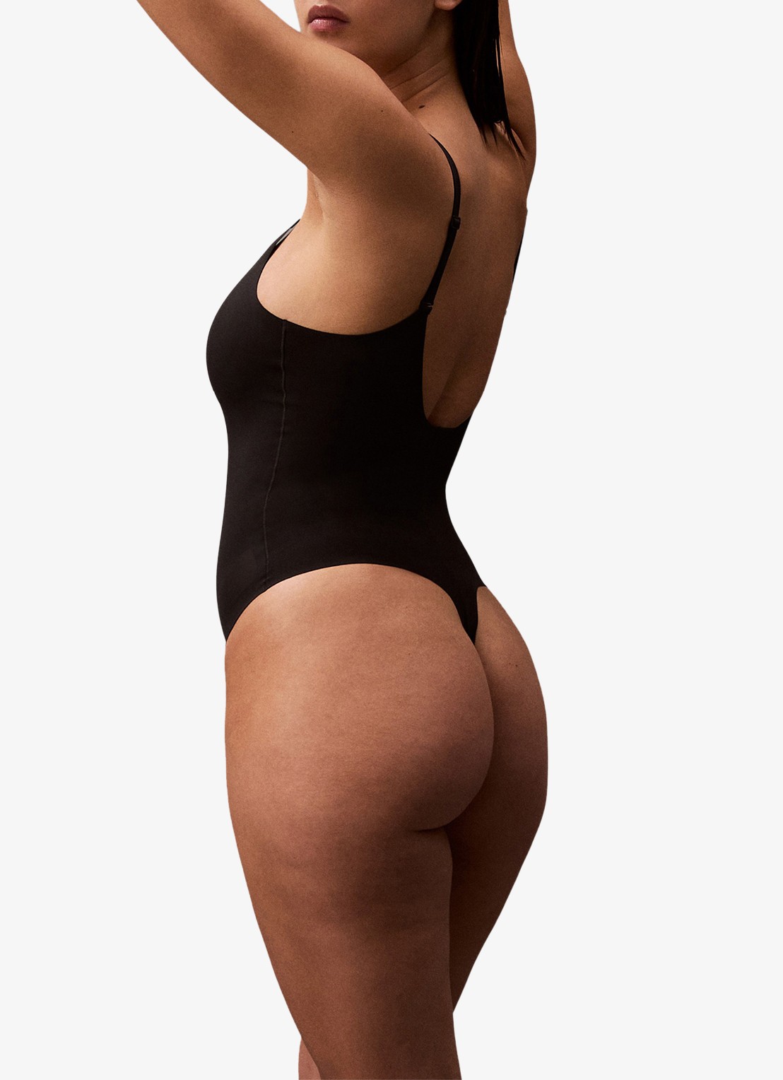 Calvin Klein Corrigerende string body - achterkant zwart