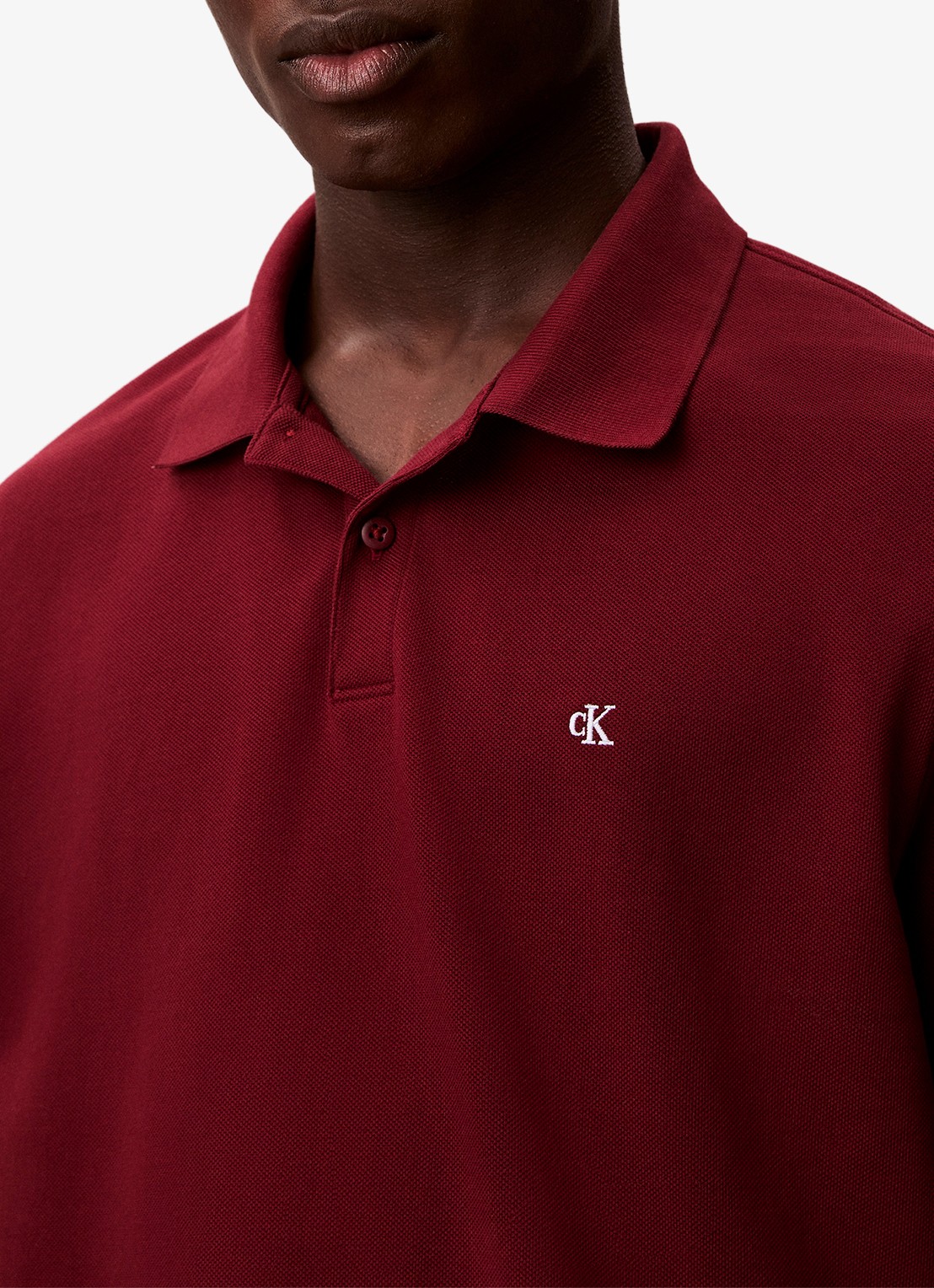 Calvin Klein Polo van piqué katoen met logoborduring - detail 6 bordeauxrood