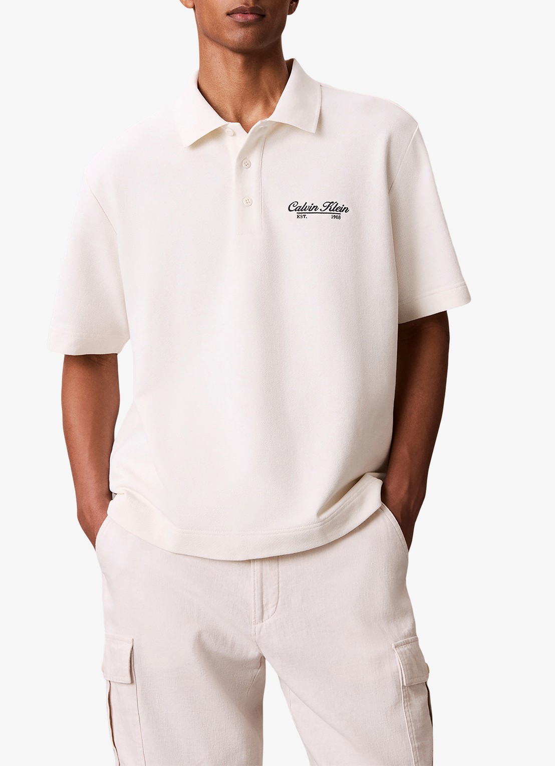 Calvin Klein Regular fit polo met logoborduring - detail ivoor
