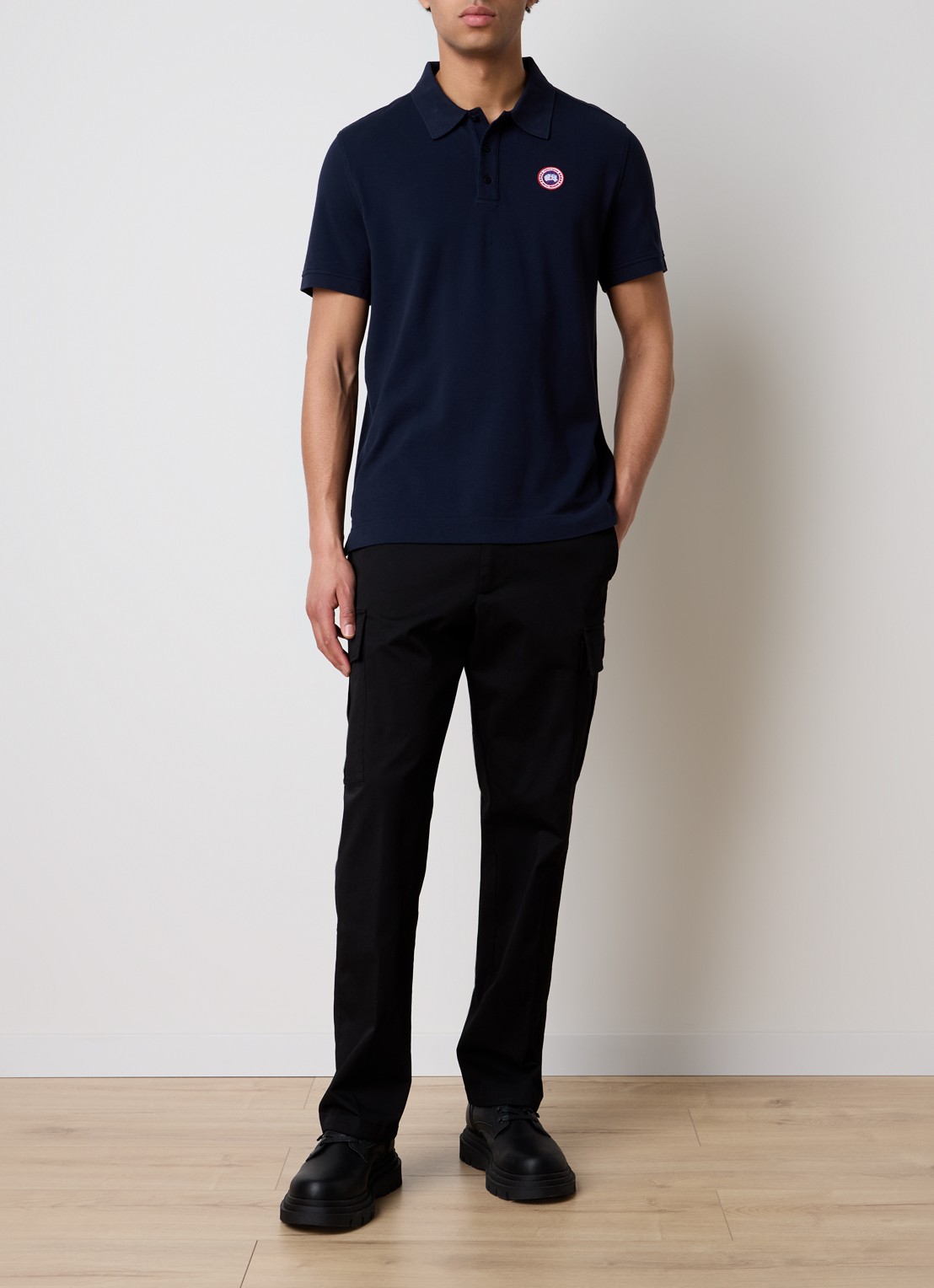 Canada Goose Beckley regular fit polo van piqué katoen met logoborduring - voorkant 2 donkerblauw