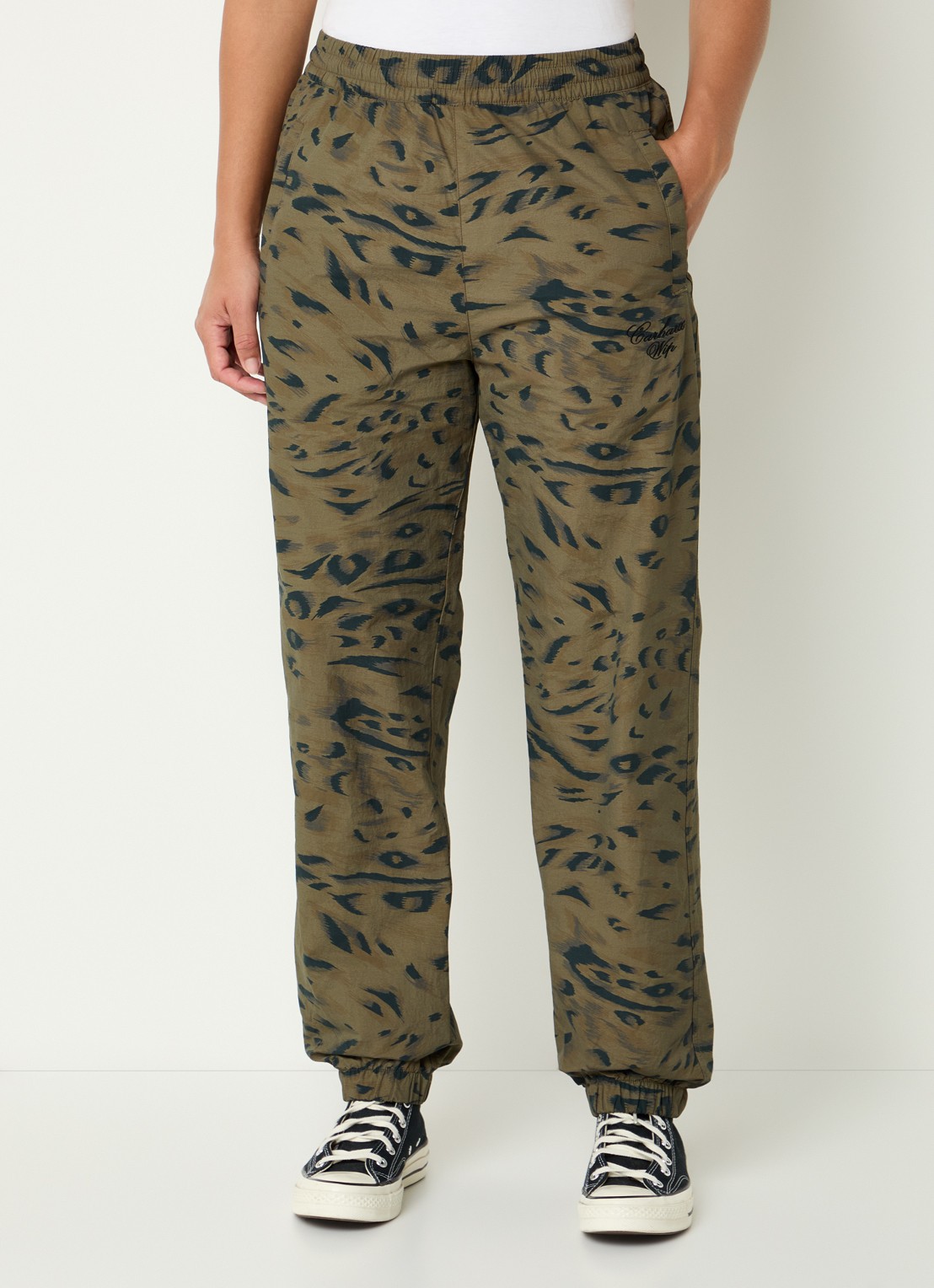 Carhartt WIP High waist tapered fit trackpants met steekzakken - detail 4 bronsgroen