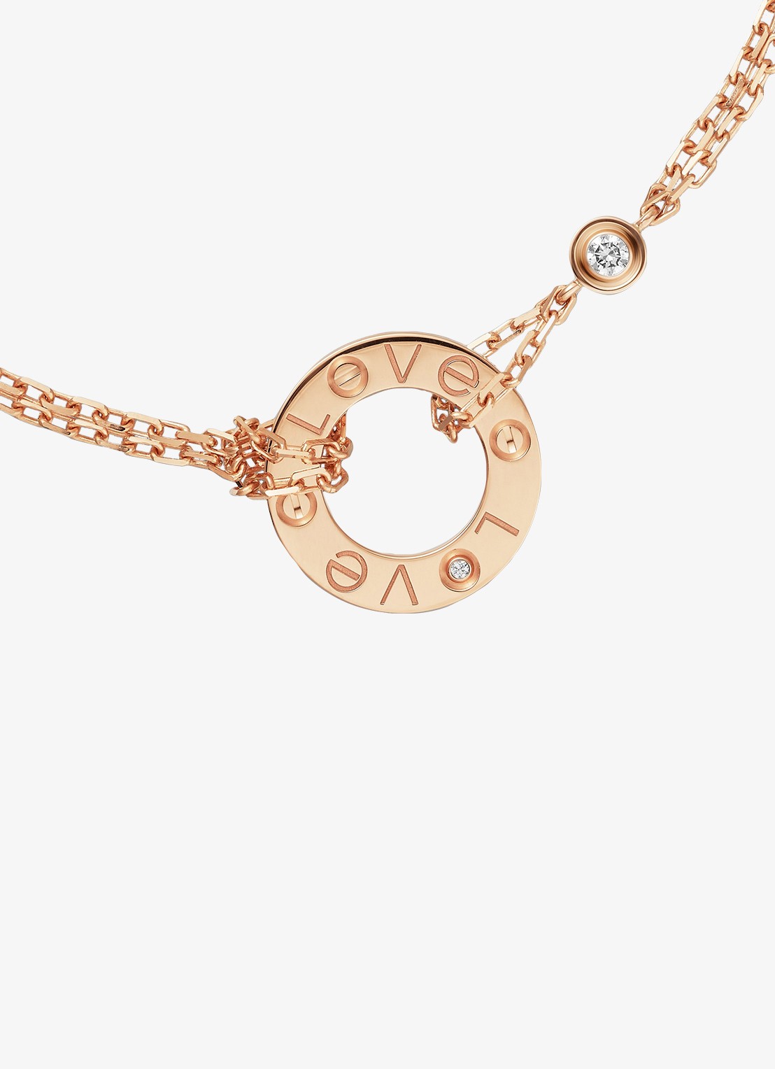 Cartier LOVE armband, van 18 karaat roségoud met 0.03 ct diamant CRB6063600 - detail 5 roségoud