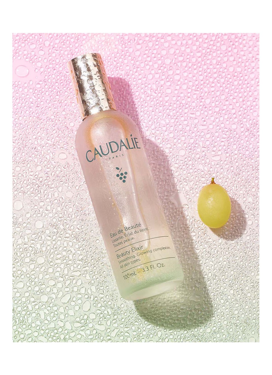 Caudalie Beauty Elixir - 2-in-1 verzorgende face mist & make-up setting spray - voorkant 2 roze