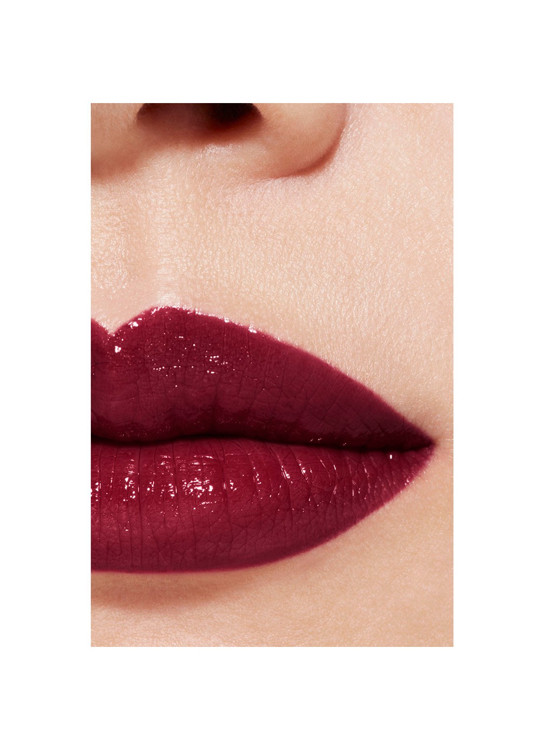 CHANEL DE LANGHOUDENDE HYDRATERENDE EN GLADSTRIJKENDE VERZORGENDE LIPPENSTIFT MET SATIJNGLANS - detail 5 140 rotonde