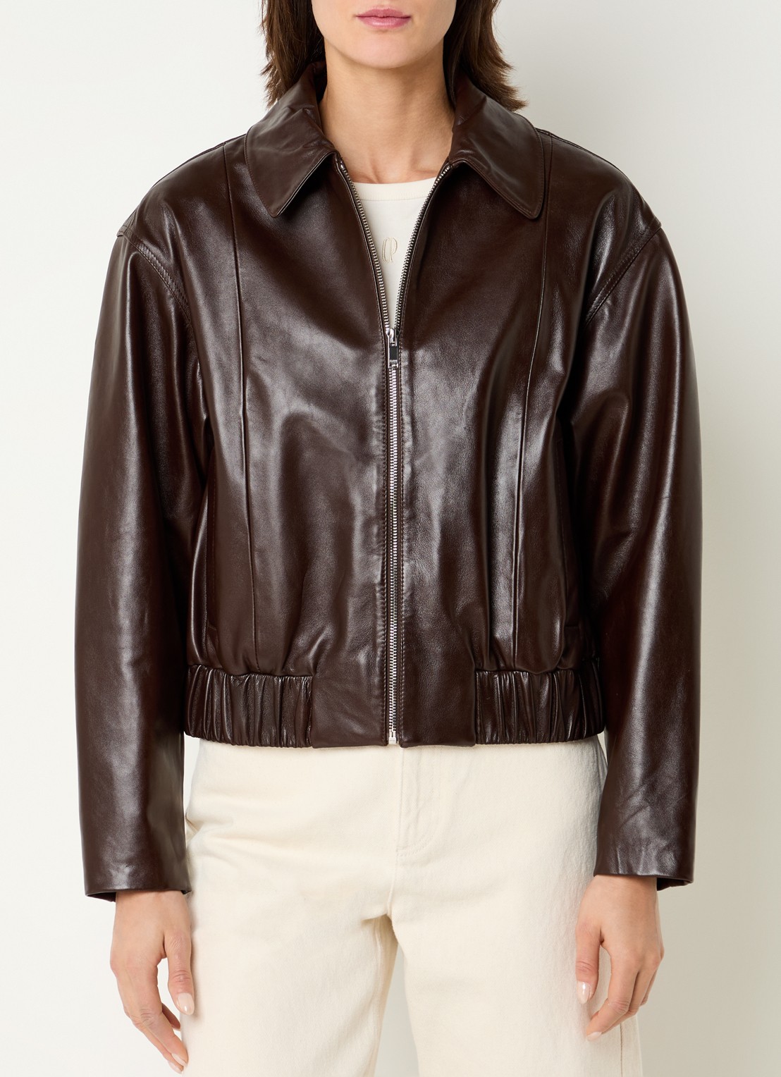 Claudie Pierlot Cropped jack van lamsleer met steekzakken - detail donkerbruin