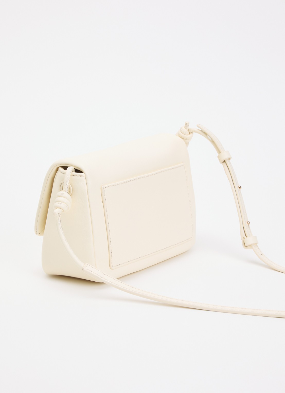 Claudie Pierlot Crossbodytas van lamsleer met logo  - achterkant 2 ivoor