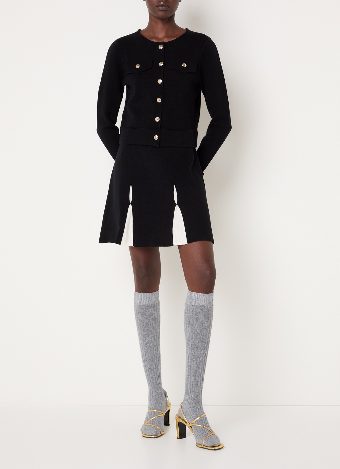 Claudie Pierlot Fijngebreide high waist mini plooirok in wolblend - voorkant 4 zwart
