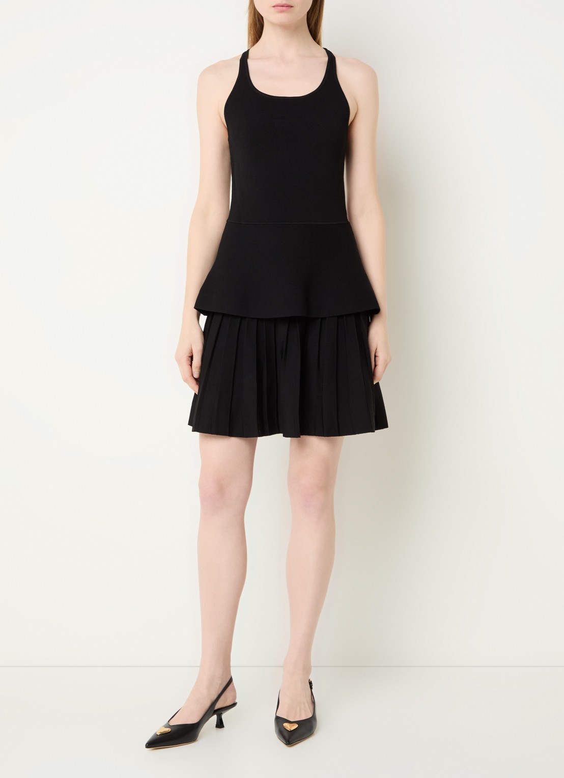 Claudie Pierlot Manuci fijngebreide mini jurk met peplum en plissé - voorkant 2 zwart