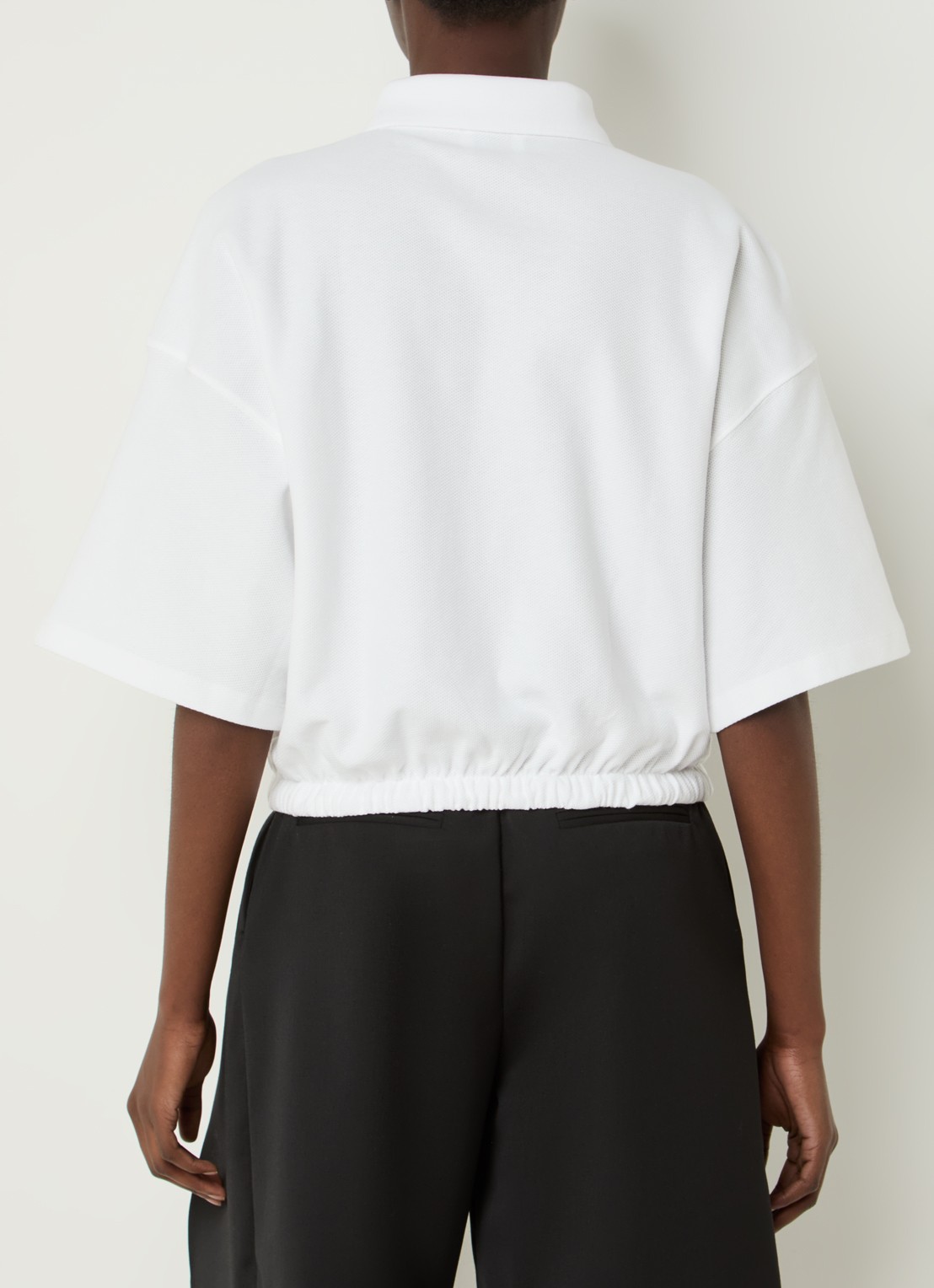 Claudie Pierlot Regular fit polo van piqué katoen met trekkoord - achterkant gebroken wit