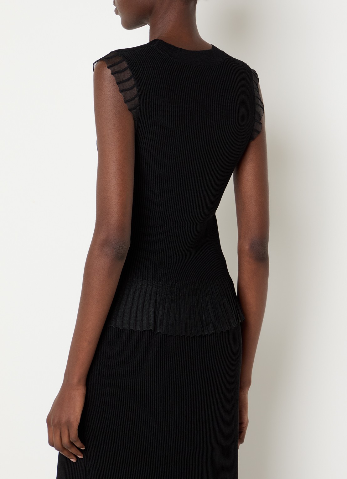 Claudie Pierlot Ribgebreide top met volant en details van mesh - achterkant 3 zwart