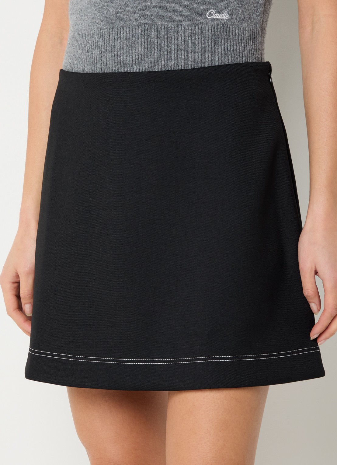 Claudie Pierlot Syna mini rok met stretch - detail zwart